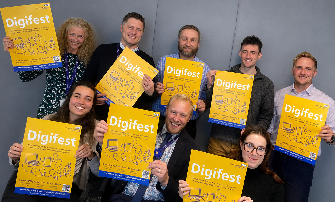 image of a group of the team holding Digifest notices